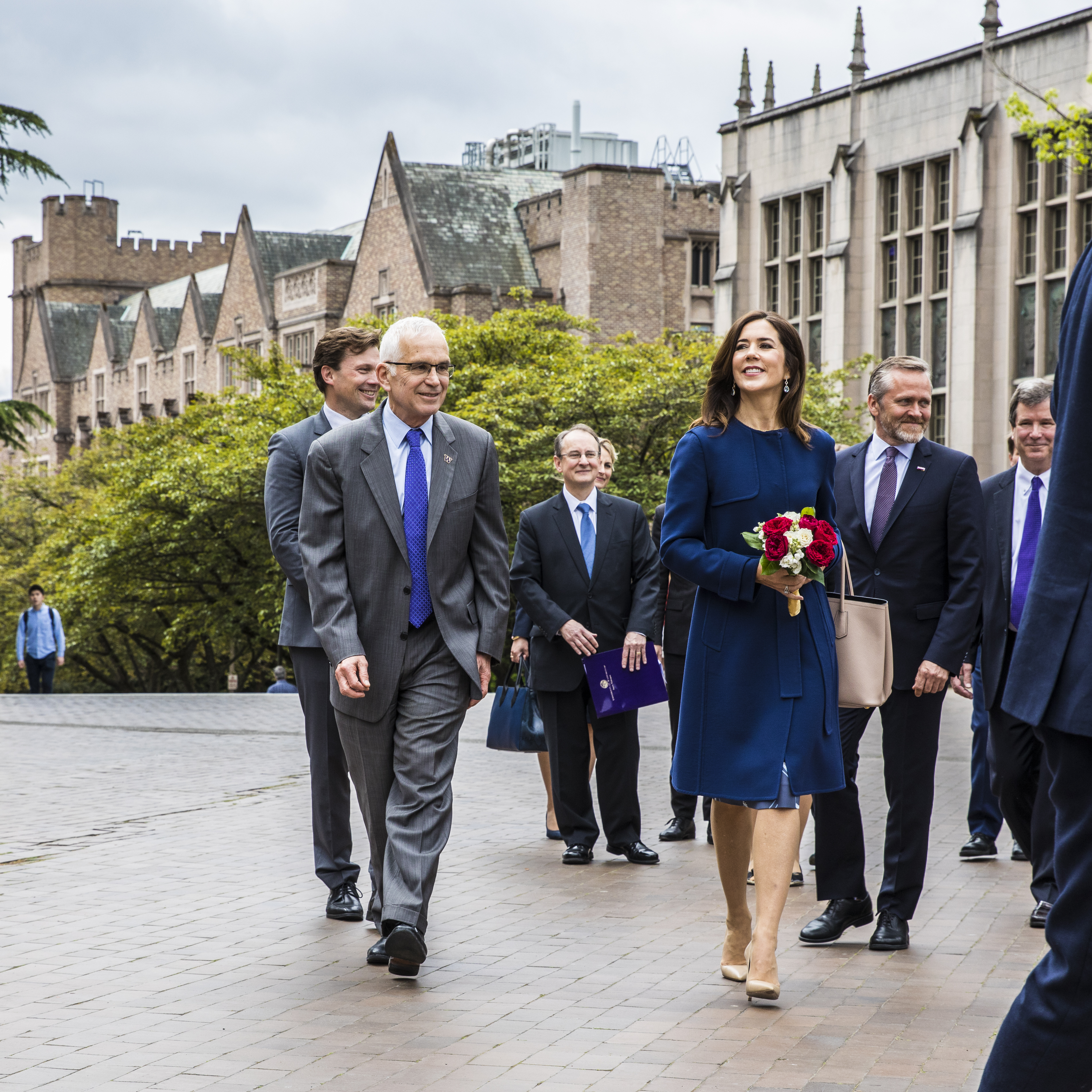 Denmark's Crown Princess Mary walks across Red Square accompanied by Provost Jerry Baldasty.