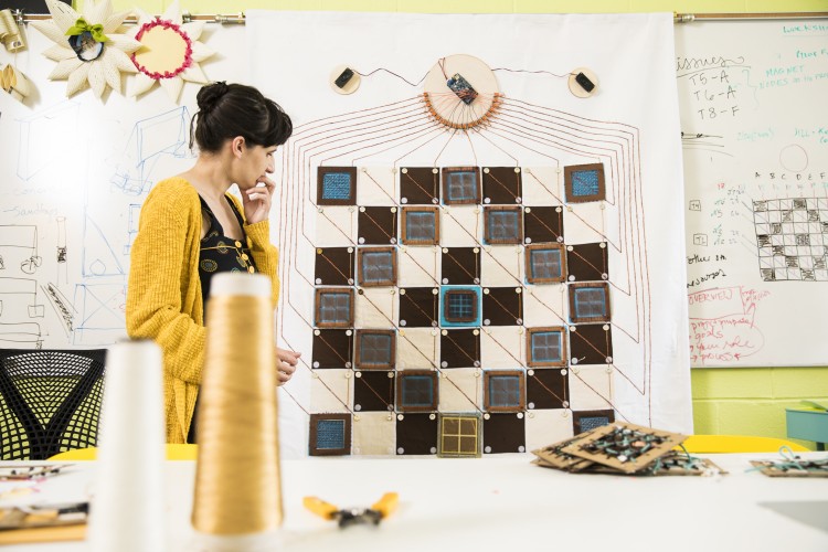 Rosner examines the quilt