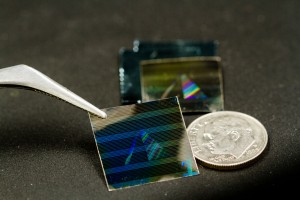 analog microfiche on thin sheets of nickel with a dime for scale