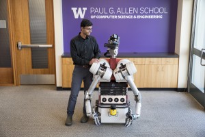 Siddhartha Srinivasa with a robot