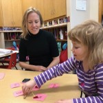 A study this summer will examine how the word-recognition portion of the brain develops in preschoolers. Photo of young child sorting cards with simple words on them.