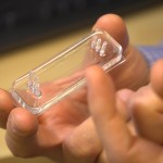 a hand holding the new device