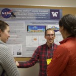 people in front of poster