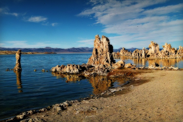 jagged rocks in blue lake