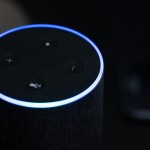 An Amazon Alexa lights up
