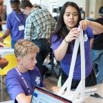 Who's in this photo (left to right): Favian Gil from Wapato, 8th grade (red shirt) Ivar Light from Burlington, 9th grade (sitting) UW mechanical engineering major Jocelyn Panchal Team "Vas"