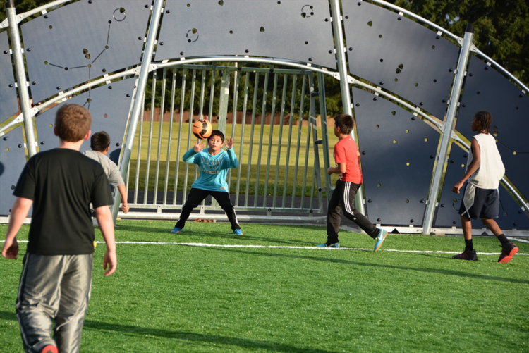Photo of children playing soccer
