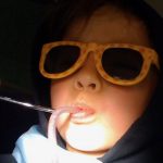Child in dentist chair during procedure