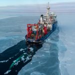 ship surrounded by ice