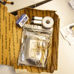 A postal service box with lab materials inside