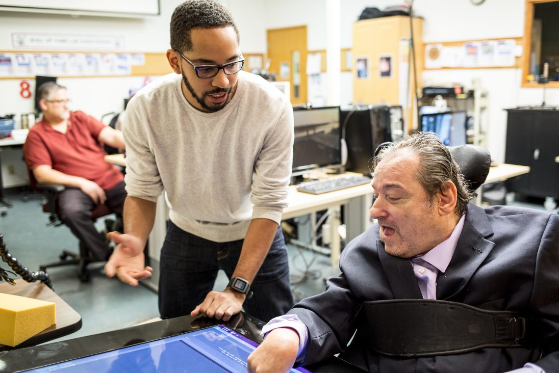 researcher works with subject