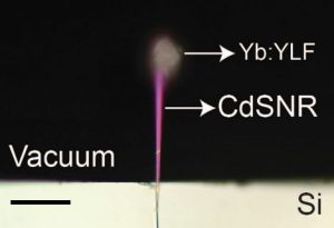 An image of an experiment where researchers used a laser to cool a semiconductor material.