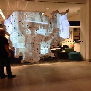 A photo from the video installation "The Age of the Kampuchea Picture" at UW Libraries. 2017.