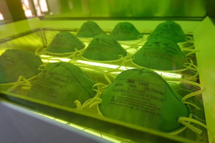 N95 masks under a green light