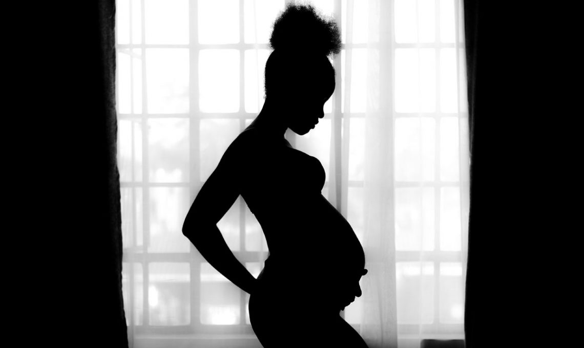 silhouette of pregnant woman