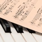 piano and sheet music - story is about UW Libraries opening up wider online access to texts and media during the pandemic