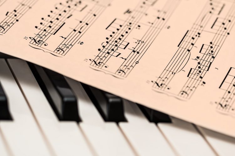 piano and sheet music - story is about UW Libraries opening up wider online access to texts and media during the pandemic