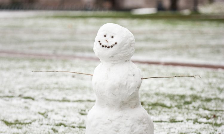 smiling snowman on campus