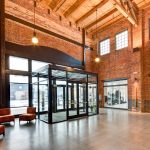 inside of a warmly lit brick building