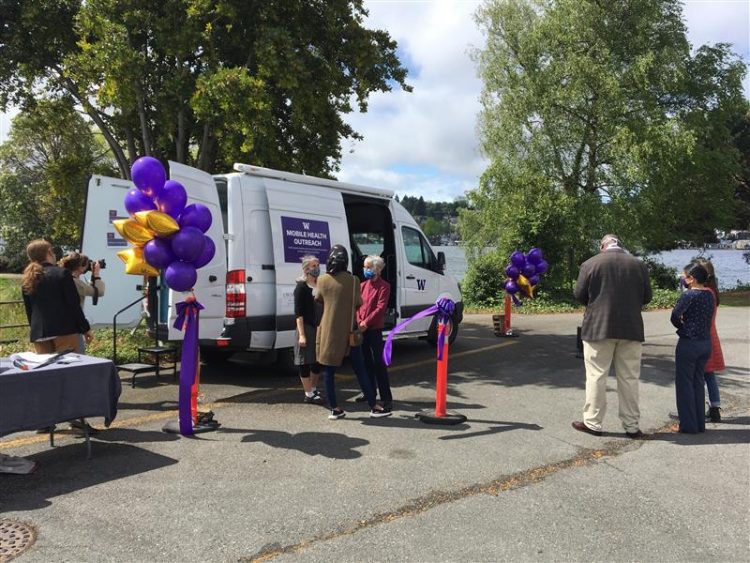 People around medical van