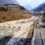 A destroyed hydroelectric plant in the mountains