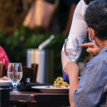 Restaurant server at table