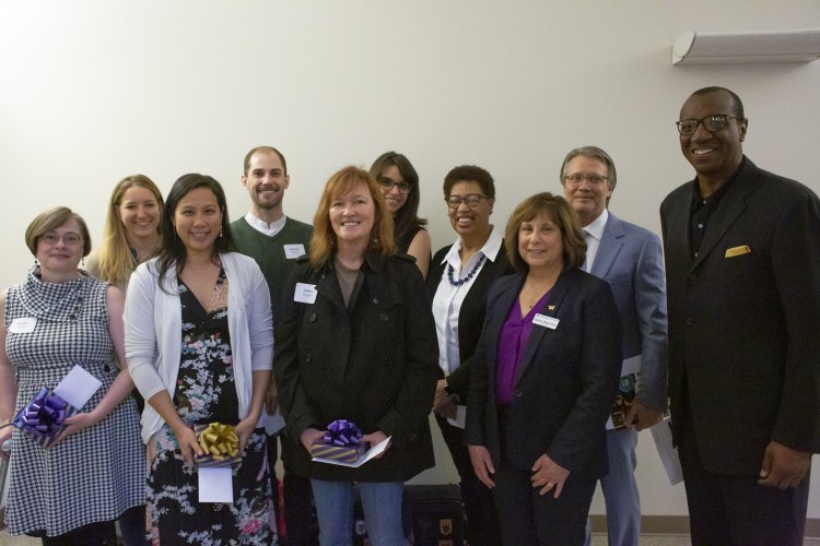 The 2019 Symposium Mentor Awardees smiling at the camera.