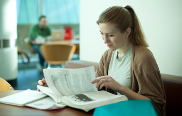 Student reading a book
