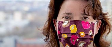 Hillary Godwin, dean of the UW School of Public Health, wears a facemask