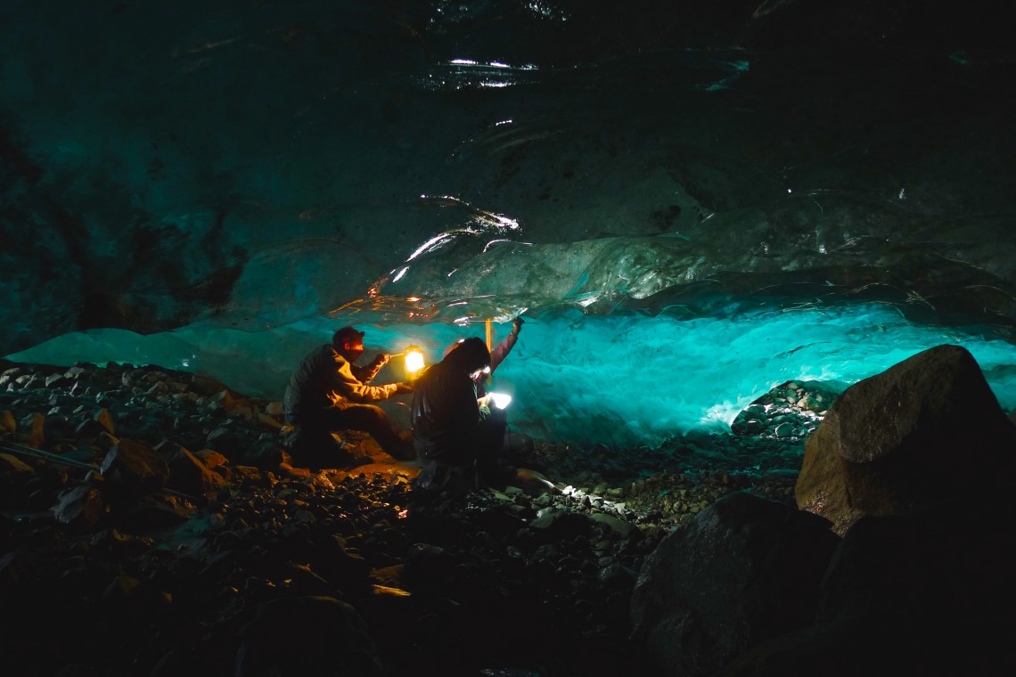 Students measure scallops in the ice under the Llewellyn Glacier on the Juneau Icefield. Markle, there as a guide and teacher, also served as an impromptu photographer. There is a very active river network under — and inside — many glaciers, and the cave completely flooded a day later.