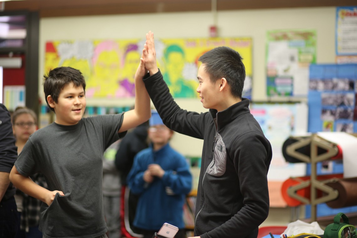 Danny Ma, a UW freshman interested in engineering, led the science group. “Isaiah wants to be a marine biologist, but he’s open to all science,” he says. “Elliott’s interested in being an engineer. On the first day, he talked to me about teleportation — he’s been thinking about it a lot.”