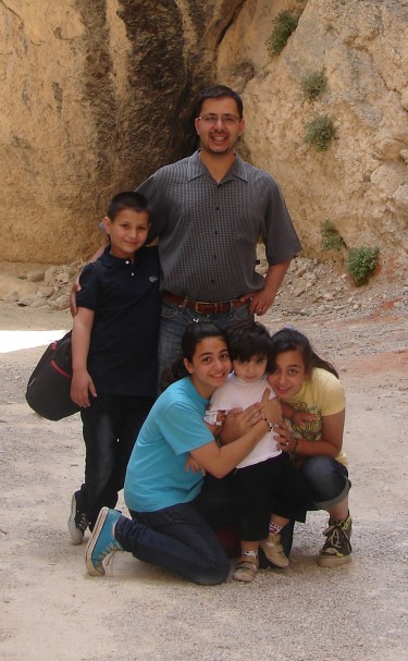 Test caption for Malak Shalabi family photo.