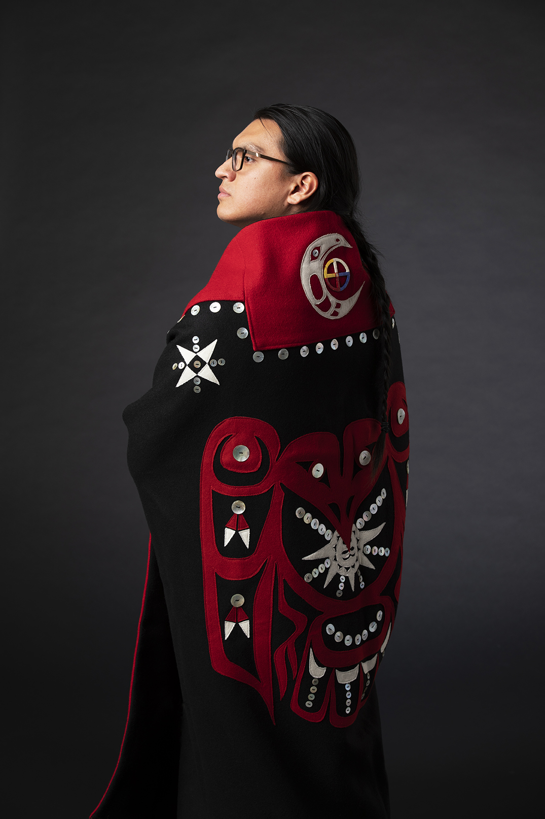 Students pose for portraits of themselves as Husky 100 members.