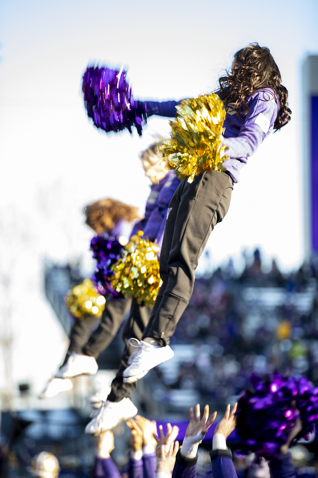 UW Cheer mid-routine during the 112th Apple Cup, which the Huskies won 31–13 in their seventh consecutive victory over Washington State University. Photo by Dennis Wise