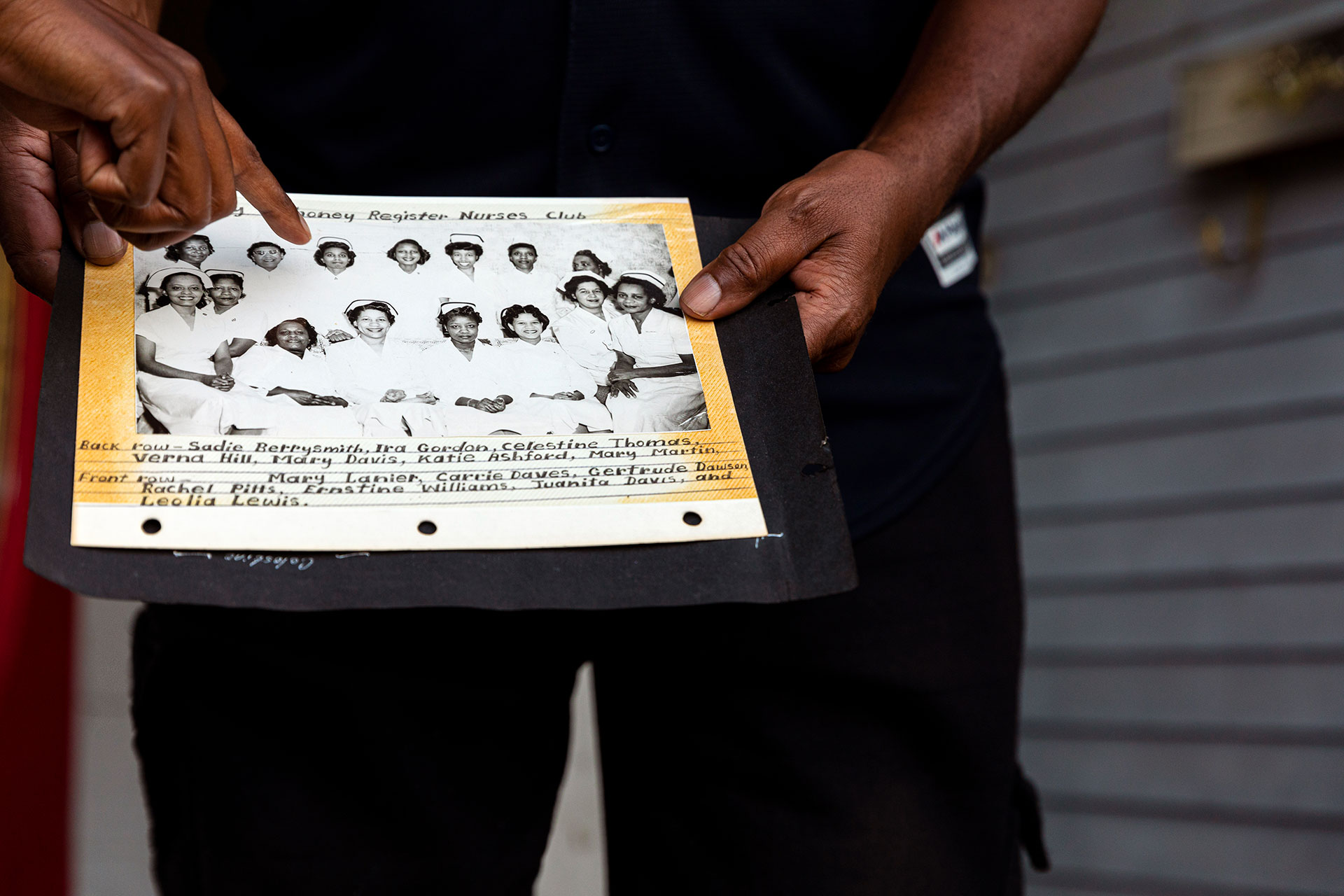 Danyelle Thomas points out her grandmother, Celestine Thomas, who helped found the Mary Mahoney Register Nurses Club (now the Mary Mahoney Professional Nurses Organization) in 1949. After moving to Seattle, Celestine Thomas worked as a nurse at Harborview Medical Center, one of the few places where Black nurses could find work at the time. Later in her career, after having three children, she became a nurse practitioner; her determination in both her career and her life continue to inspire her granddaughter.