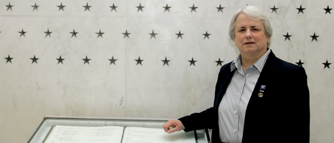 Noyes spent decades climbing the ranks — and mentoring others — in the CIA. Here, she pauses at the CIA Memorial Wall on the day of her retirement in 2006.