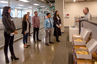 Students tour the PEMCO office
