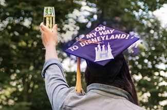 student at grad toast