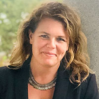 Portrait: Commissioner Kate Dean