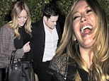 That's why she married him! Hilary Duff is left in fits of giggles after date night with husband Mike Comrie