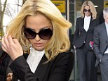 Sarah Harding banned for driving for six months and given �500 fine after being caught on her phone while behind the wheel
