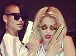 Bad timing: (L-R) Adrienne Bailon, Cassie and Rita Ora pose with fake guns in a photo on the singer's Instagram page