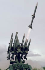 Missile being fired from a HAWK-AMRAAM universial missile system