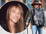 Walking stick: Guns N' Roses singer Axl Rose walked with a cane while out with friends on Tuesday in New York City