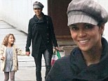 A purr-fect look! Halle Berry dons Catwoman-esque leather trousers as she picks up daughter Nahla