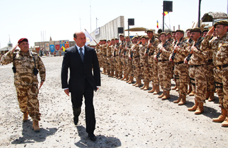 Lt. Col. Gabriel Toma, commander of the Romanian Army�s 26th Infantry Battalion, conducts an inspection of troops with Romanian President Traian Basescu, during an end-of-mission ceremony June 4, 2009, at Contingency Operating Base Adder, Iraq. U.S. Army photo by Sgt. Mark Miranda.