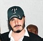 High-roller: Helly Nahmad, right, is the son of a billionaire art dealer who has his own gallery on New York's tony Madison Avenue. He is pictured here with Victoria's Secret model Miranda Kerr