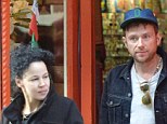 City break: Damon Albarn and Suzi Winstanley were seen shopping in New York on Monday 