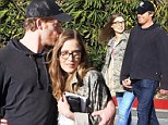 Sealed with a kiss: Michael C. Hall showers his novelist girlfriend with affection on a lunch date