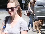 Leading lady! Les Miserables star Amanda Seyfried takes four legged friend for a walk